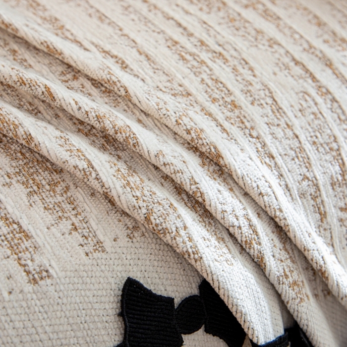 91家纺网 家纺一手货源 找家纺 沐沐家纺 2026新款宛柔蝴蝶结裙边沙发巾 驼色