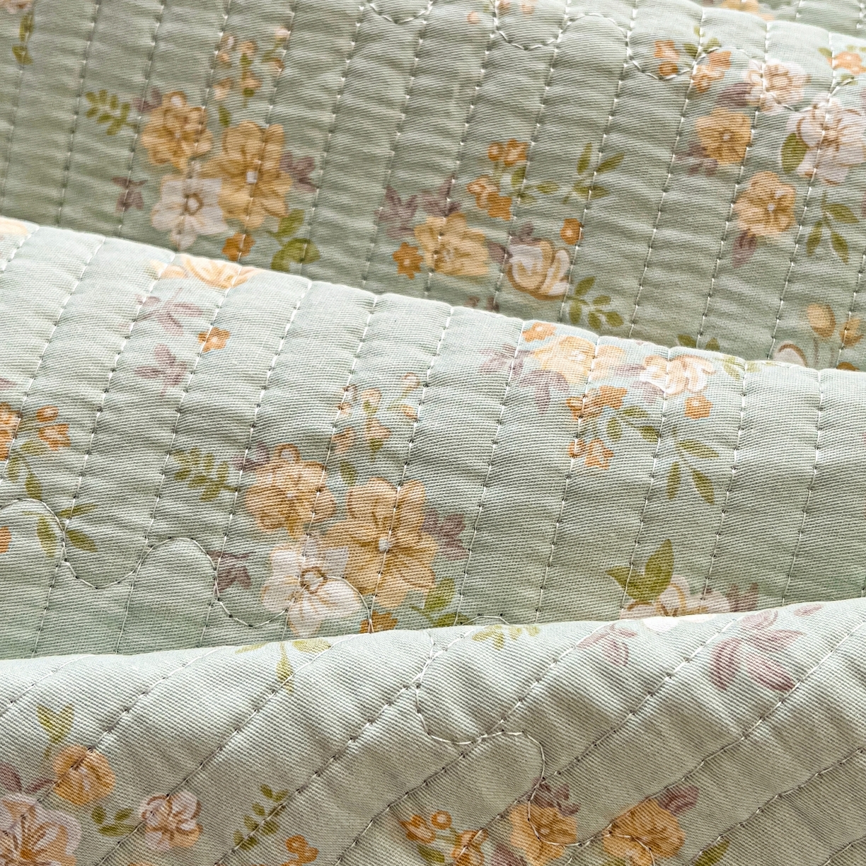 91家纺网 家纺一手货源 找家纺 暖萌 2025新款A类全棉棉花床盖印花三件套 花蜜-绿