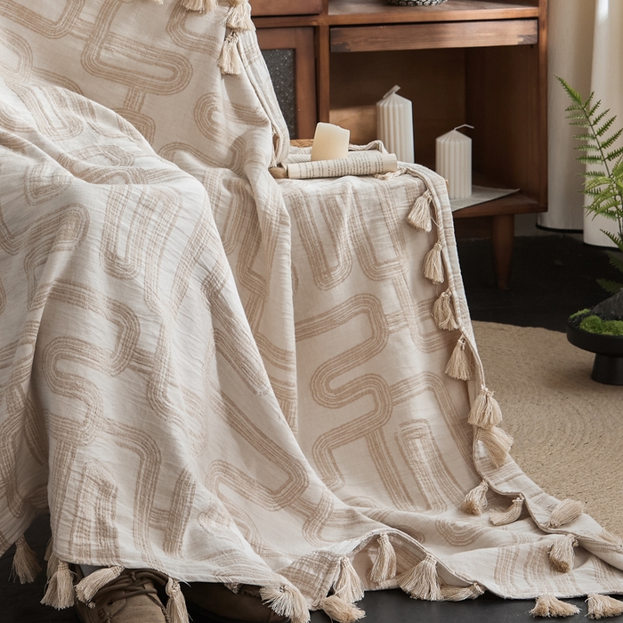 91家纺网 家纺一手货源 找家纺 大彩家居 2025新款棉麻流苏毯 ‌摩登几何