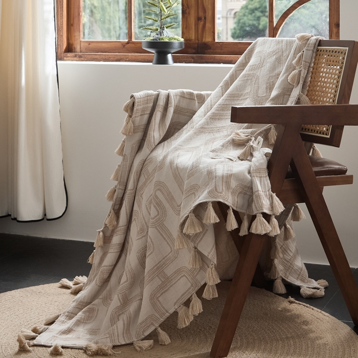 91家纺网 家纺一手货源 找家纺 大彩家居 2025新款棉麻流苏毯 ‌摩登几何