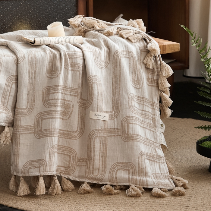 91家纺网 家纺一手货源 找家纺 大彩家居 2025新款棉麻流苏毯 ‌摩登几何