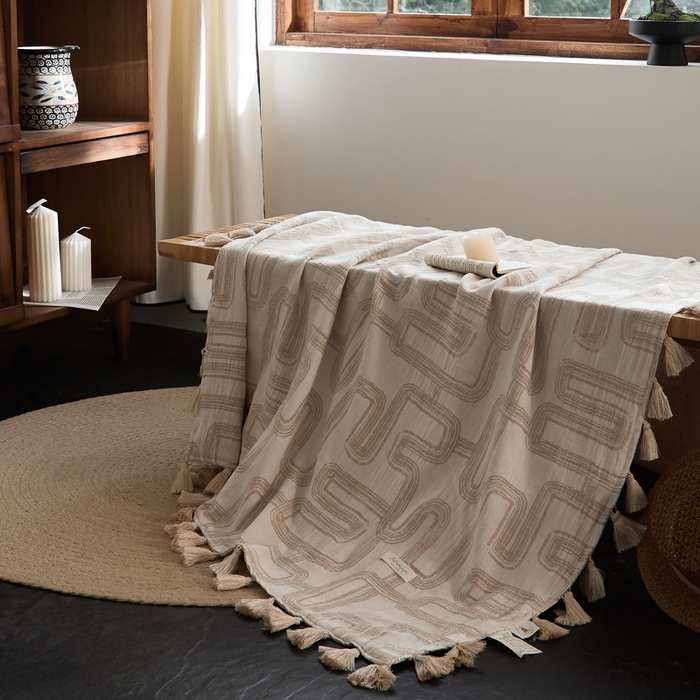 91家纺网 家纺一手货源 找家纺 大彩家居 2025新款棉麻流苏毯 ‌摩登几何