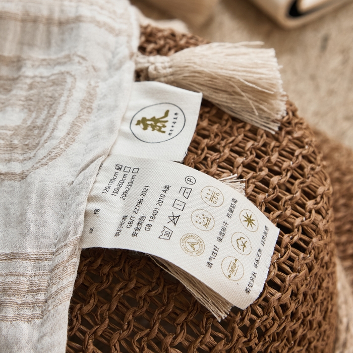 91家纺网 家纺一手货源 找家纺 大彩家居 2025新款棉麻流苏毯 ‌摩登几何