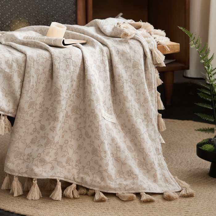 91家纺网 家纺一手货源 找家纺 大彩家居 2025新款棉麻流苏毯 ‌藤蔓