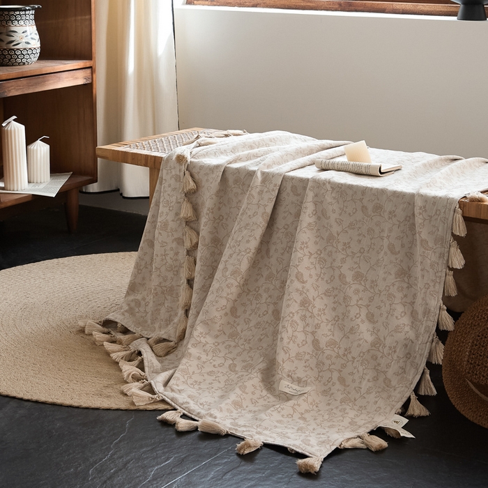 91家纺网 家纺一手货源 找家纺 大彩家居 2025新款棉麻流苏毯 ‌藤蔓