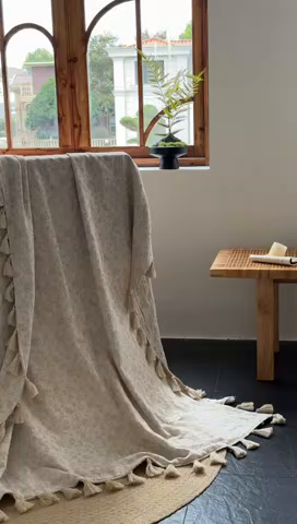 91家纺网 家纺一手货源 找家纺 大彩家居 2025新款棉麻流苏毯 ‌藤蔓