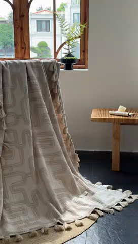 91家纺网 家纺一手货源 找家纺 大彩家居 2025新款棉麻流苏毯 ‌摩登几何