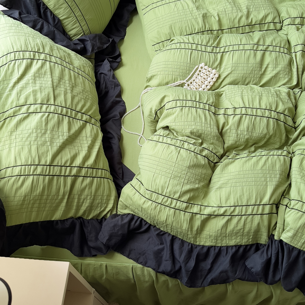 91家纺网 家纺一手货源 找家纺 优卡迪家纺馆 2025新款色织泡泡纱花边四件套 豆蔻绿