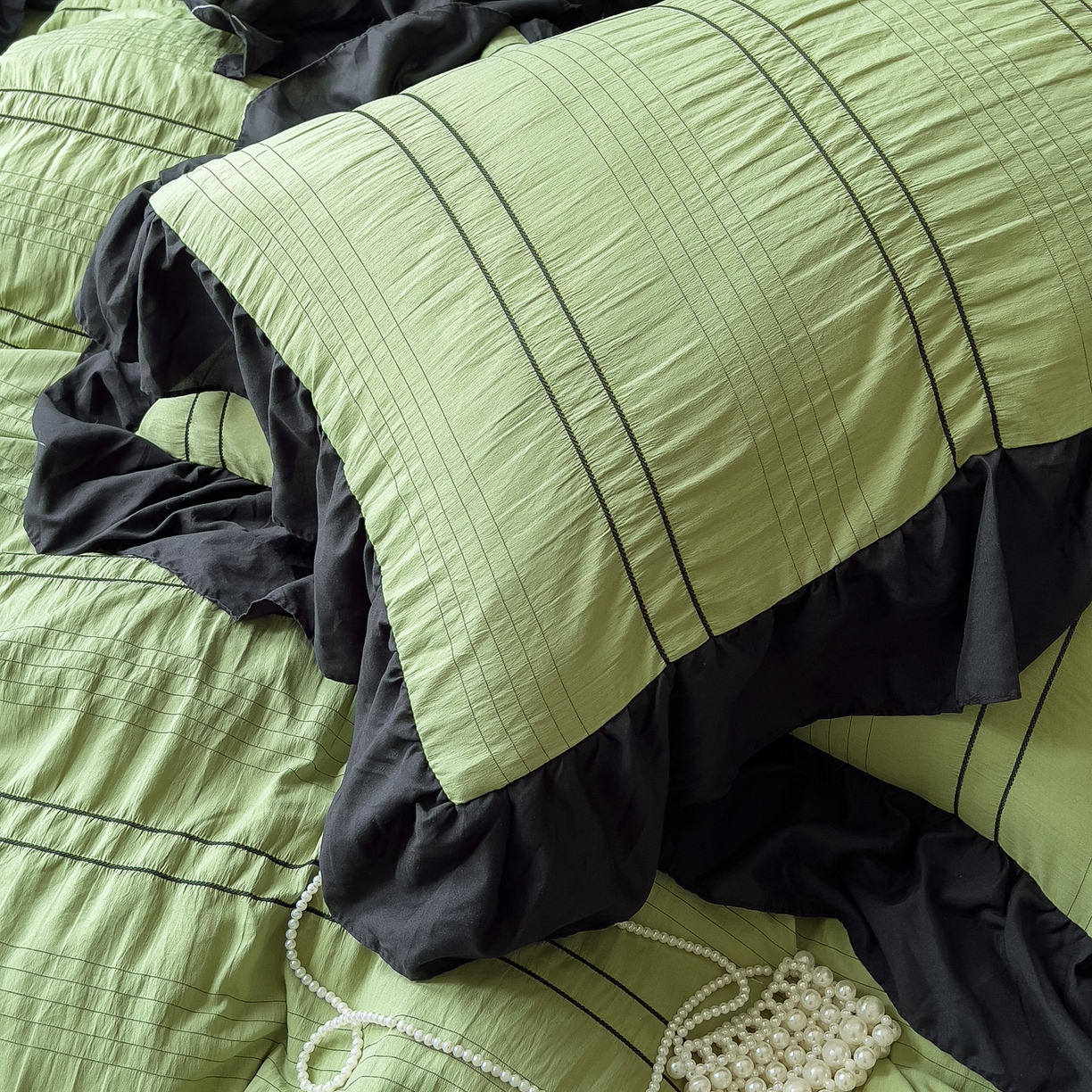 91家纺网 家纺一手货源 找家纺 优卡迪家纺馆 2025新款色织泡泡纱花边四件套 豆蔻绿