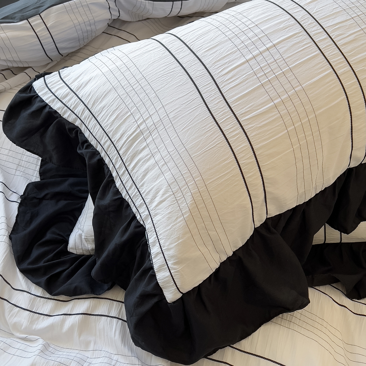 91家纺网 家纺一手货源 找家纺 优卡迪家纺馆 2025新款色织泡泡纱花边四件套 冰晶白