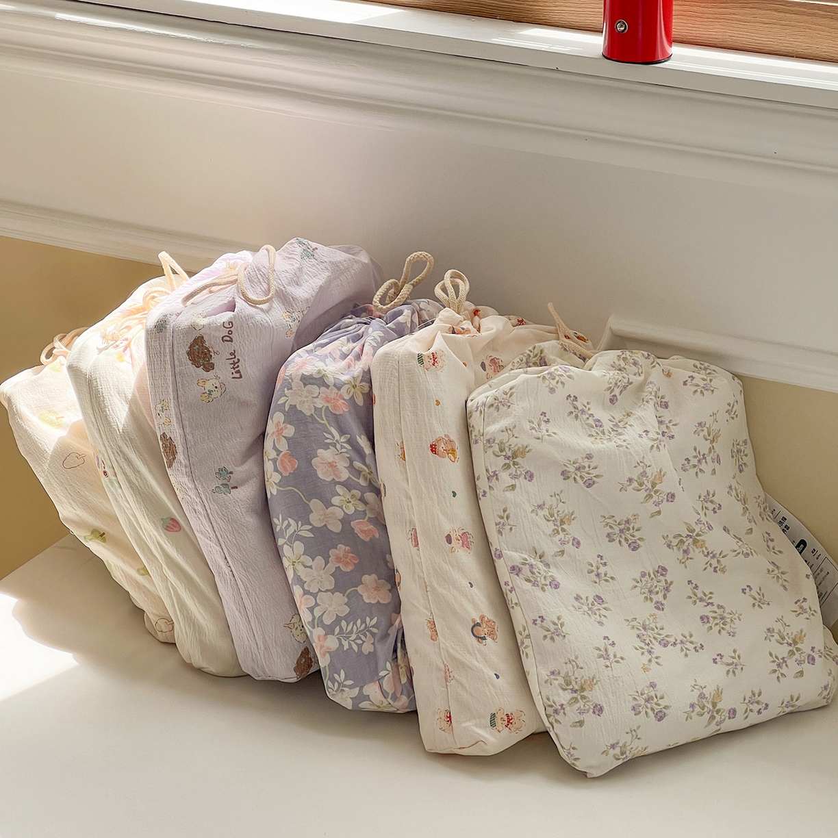 91家纺网 家纺一手货源 找家纺 一比一 2025新款古法水洗棉小布袋高克重云柔棉四件套 小布袋包装