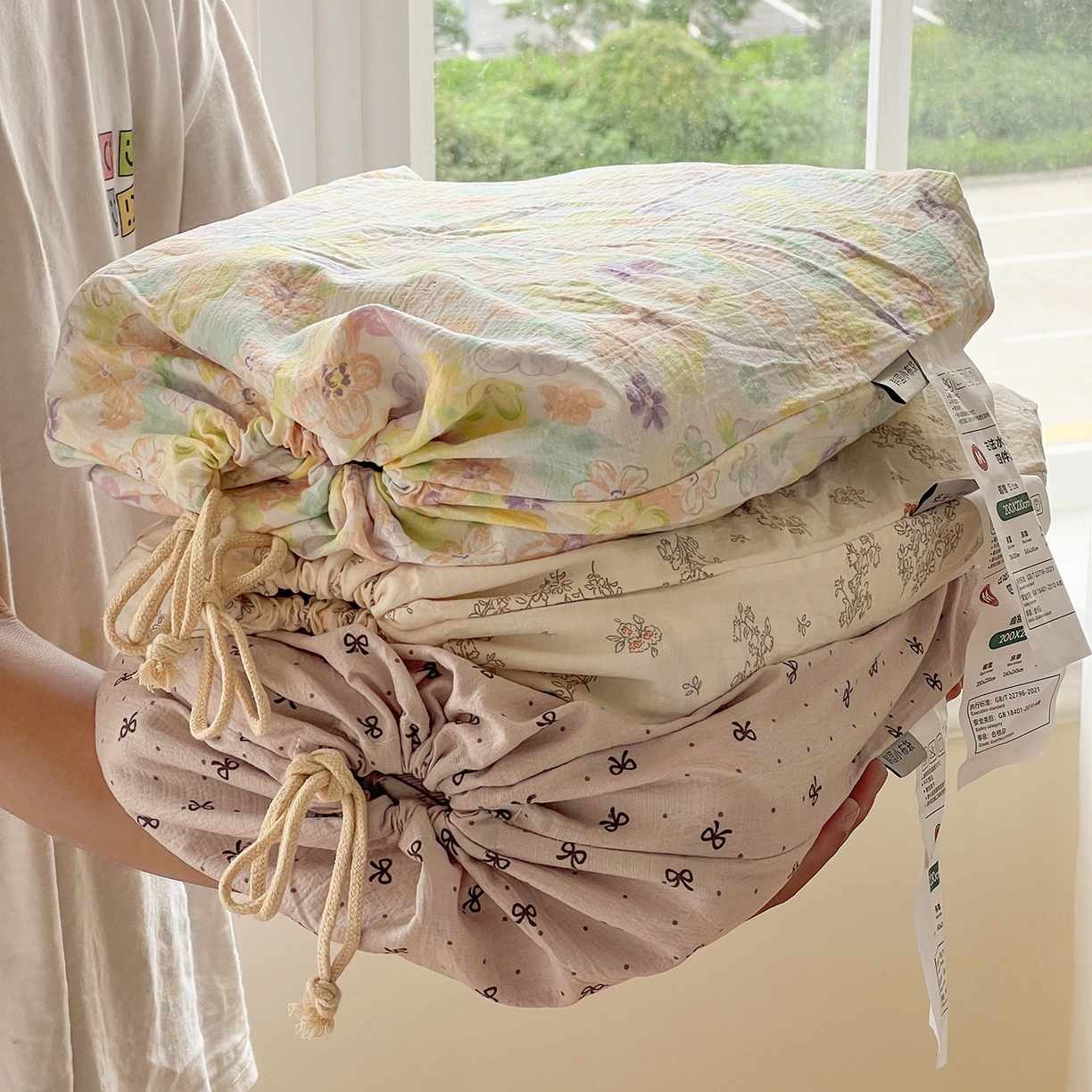 91家纺网 家纺一手货源 找家纺 一比一 2025新款古法水洗棉小布袋高克重云柔棉四件套 小布袋包装