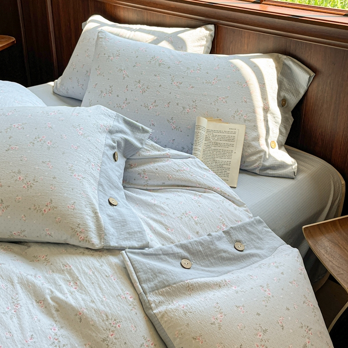 91家纺网 家纺一手货源 找家纺 爱彼家纺 2025新款亲肤舒适原麻亚麻水洗棉四件套-纽扣款 蓝雾漫枝
