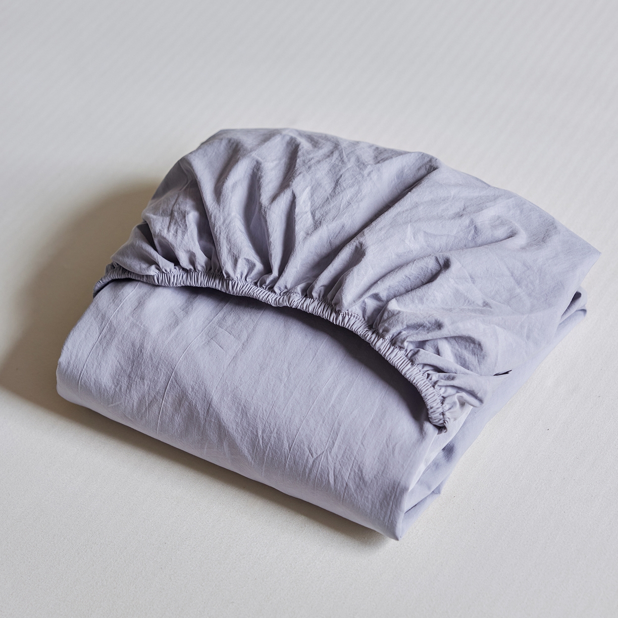 91家纺网 家纺一手货源 找家纺 轩和家居 2025新款70S砂洗长绒棉单床笠 云水