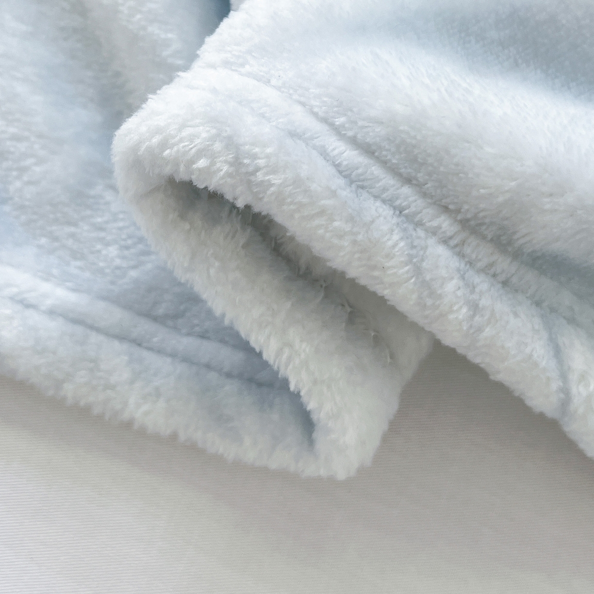 91家纺网 家纺一手货源 找家纺 初念 2025新款四季款双面牛奶绒多功能毛毯 可爱狗头-蓝