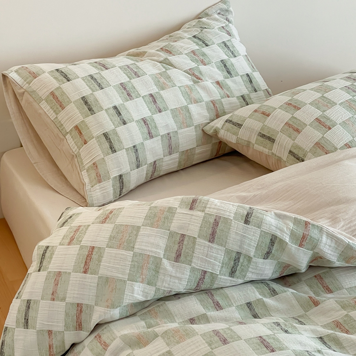 91家纺网 家纺一手货源 找家纺 云上 2025新款三层纱全棉纯棉色织大提花曲奇格子四件套 曲奇绿格