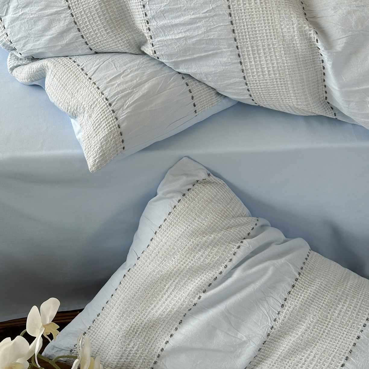 91家纺网 家纺一手货源 找家纺 云上 2025新款法式全棉纯棉串绳华夫格四件套 串绳-浅蓝