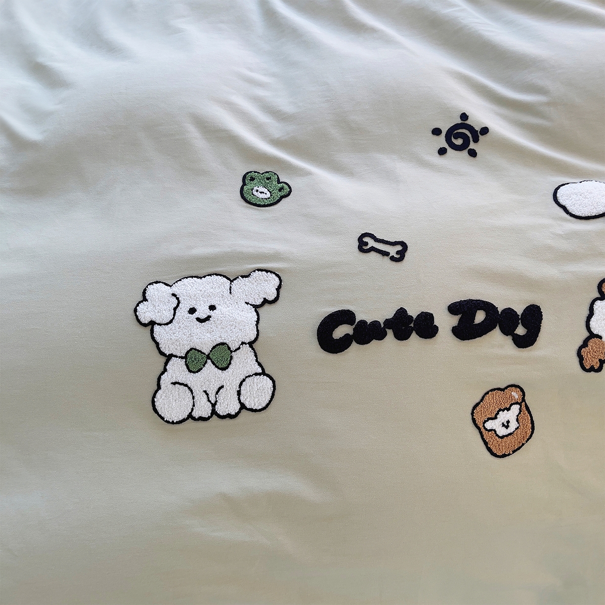 91家纺网 家纺一手货源 找家纺 炫拼家纺 2025新款全棉磨毛卡通毛巾绣加厚纯棉四件套-可梦系列 可梦-乖乖狗