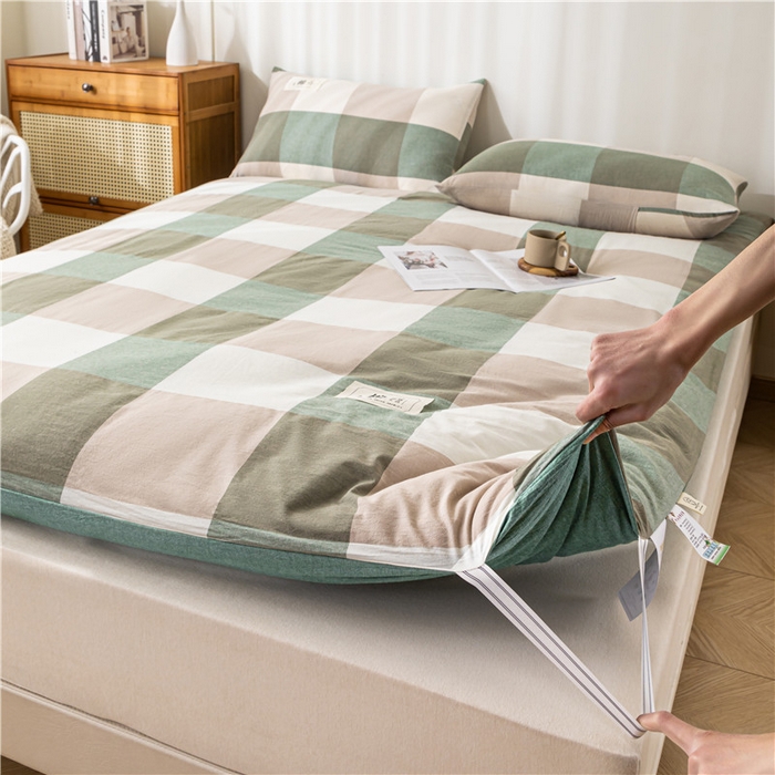 91家纺网 家纺一手货源 找家纺 悠米悠家 2025新款新疆长绒棉可拆洗棉花夹棉床褥垫成人款 极简绿格