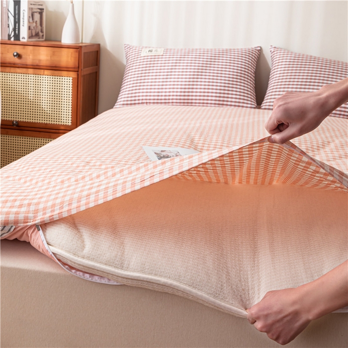 91家纺网 家纺一手货源 找家纺 悠米悠家 2025新款新疆长绒棉可拆洗棉花夹棉床褥垫成人款 橘色小格