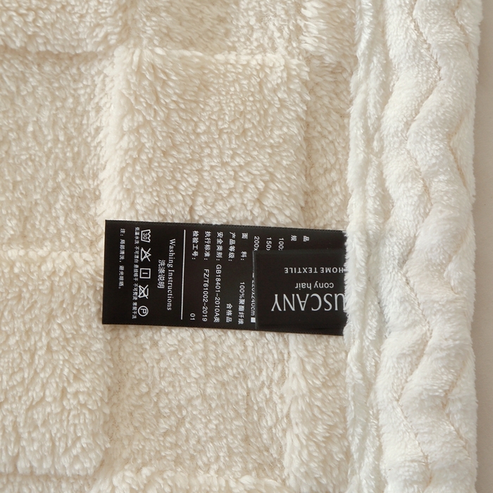 91家纺网 家纺一手货源 找家纺 栩裕纺织 2025新款意大利面包格毛毯-包边款 面包格包边款-米杏色