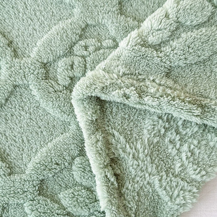 91家纺网 家纺一手货源 找家纺 栩裕纺织 2025新款塔芙绒三叶草提花毛毯-卷边款 茶绿