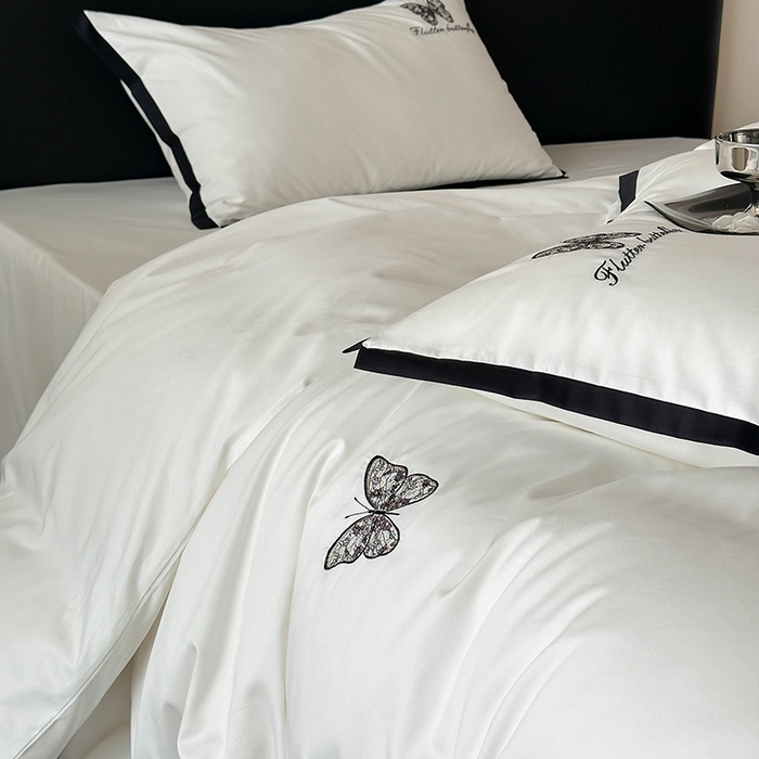 91家纺网 家纺一手货源 找家纺 简纯主义 2025秋冬新款A类100支全棉贡缎长绒棉蕾丝绣花四件套-琉璃蝴蝶 琉璃蝴蝶白