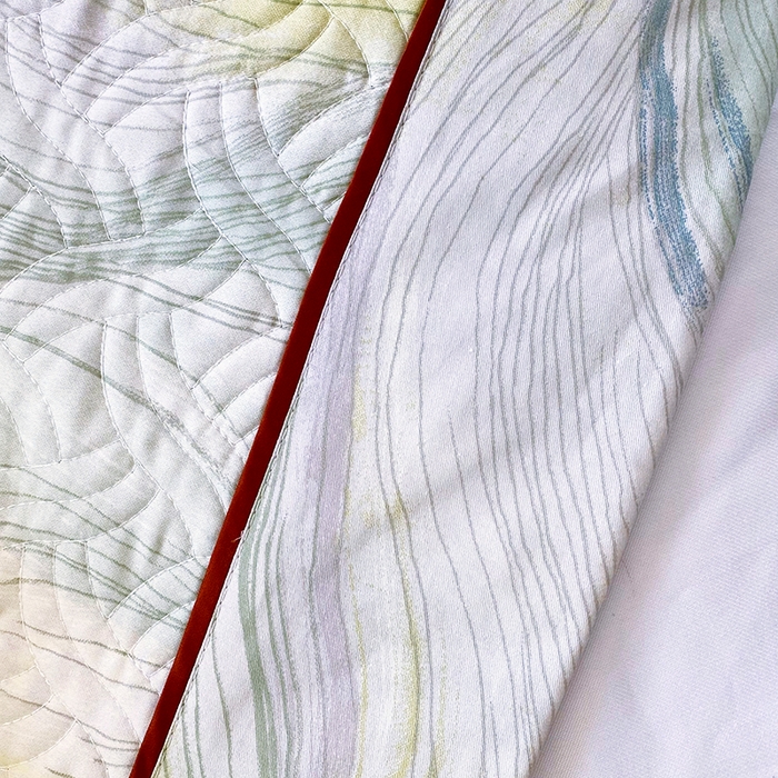 91家纺网 家纺一手货源 找家纺 畅畅家纺 2025春夏款13372全棉纯棉活性印花床盖夹棉加厚绗缝防滑床罩 时尚线条