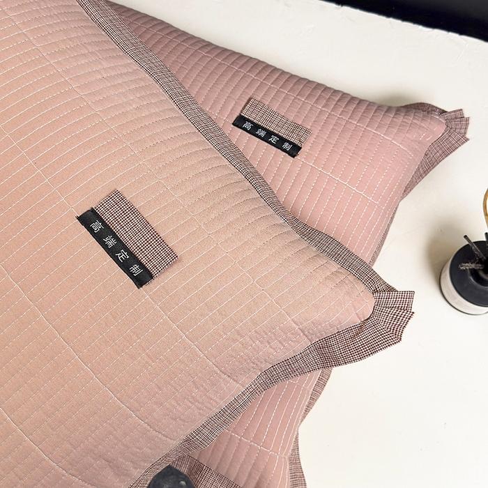 91家纺网 家纺一手货源 找家纺 呦呦南宋 纯棉绗缝48x74cm水洗棉枕套中层夹棉单品拉链款一对装全棉高端定制款平边枕套 平边橙