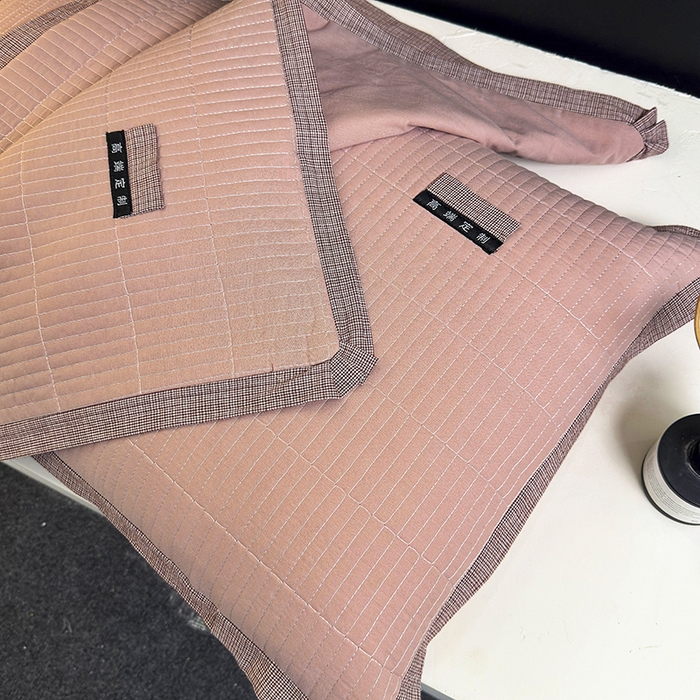 91家纺网 家纺一手货源 找家纺 呦呦南宋 纯棉绗缝48x74cm水洗棉枕套中层夹棉单品拉链款一对装全棉高端定制款平边枕套 平边橙