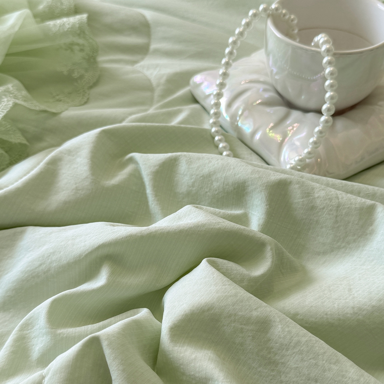 91家纺网 家纺一手货源 找家纺 罗优家纺 2025新款多功能可装被芯花朵可拆卸夏被四件套 绿色