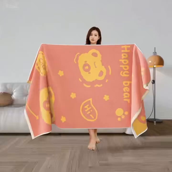 91家纺网 家纺一手货源 找家纺 悦然毛巾被 2025新款全棉色织提花毛圈浴巾 熊头澄黄 70x140cm