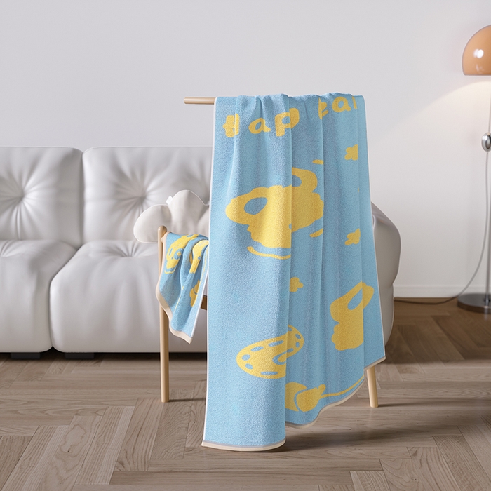 91家纺网 家纺一手货源 找家纺 悦然毛巾被 2025新款全棉色织提花毛圈浴巾 熊头蓝黄 70x140cm