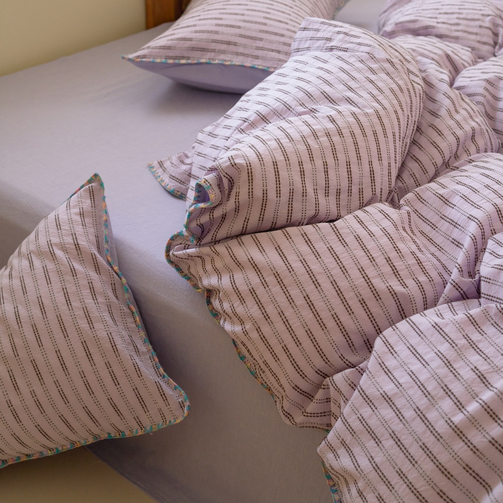 91家纺网 家纺一手货源 找家纺 洋铭区（原狠狠爱） 2025新款慕斯VS早安水洗棉彩边色织提花四件套 慕斯紫