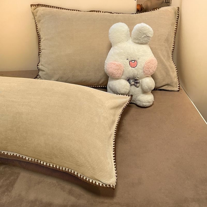 91家纺网 家纺一手货源 找家纺 ab家纺 2025新款贝壳边消光牛奶绒四件套 米灰