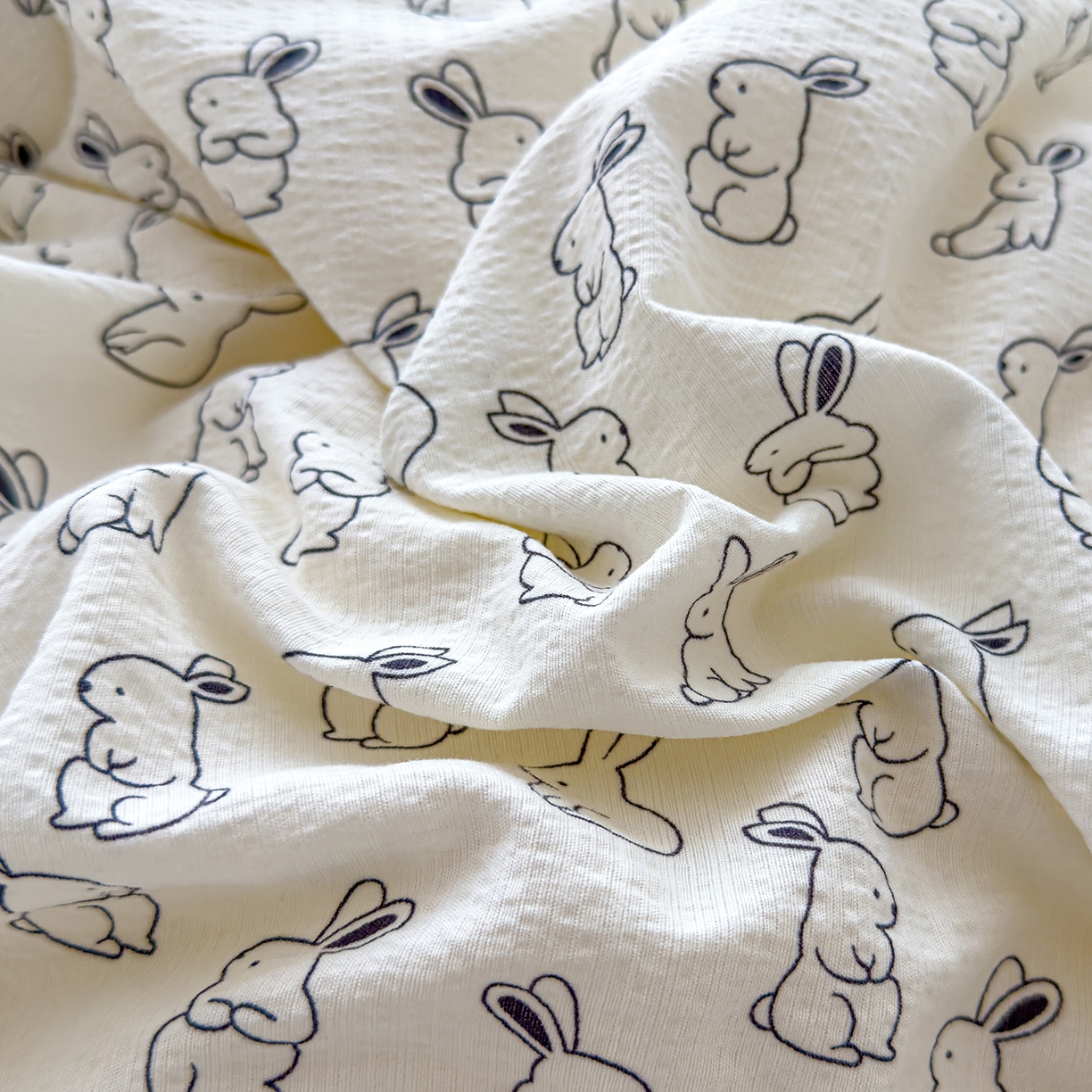 91家纺网 家纺一手货源 找家纺 芯恋家居 2025新款A类提花韩版花边豆豆冬被被子春秋被芯大豆被豆豆被 呆萌兔