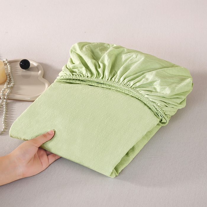 91家纺网 家纺一手货源 找家纺 一诺家居 2025新款A类云感双层纱纯色床笠针织棉母婴级裸睡床笠三件套 量大可优惠 豆蔻绿