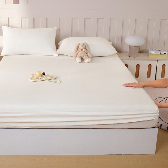 91家纺网 家纺一手货源 找家纺 一诺家居 2025新款A类云感双层纱纯色床笠针织棉母婴级裸睡床笠三件套 量大可优惠 奶昔白