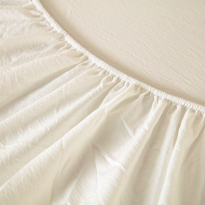 91家纺网 家纺一手货源 找家纺 一诺家居 2025新款A类云感双层纱纯色床笠针织棉母婴级裸睡床笠三件套 量大可优惠 奶昔白