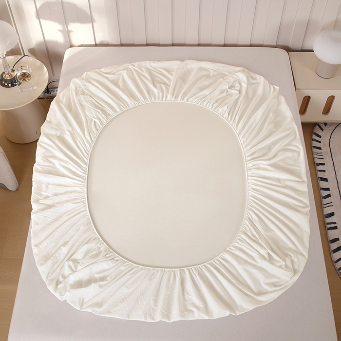 91家纺网 家纺一手货源 找家纺 一诺家居 2025新款A类云感双层纱纯色床笠针织棉母婴级裸睡床笠三件套 量大可优惠 奶昔白