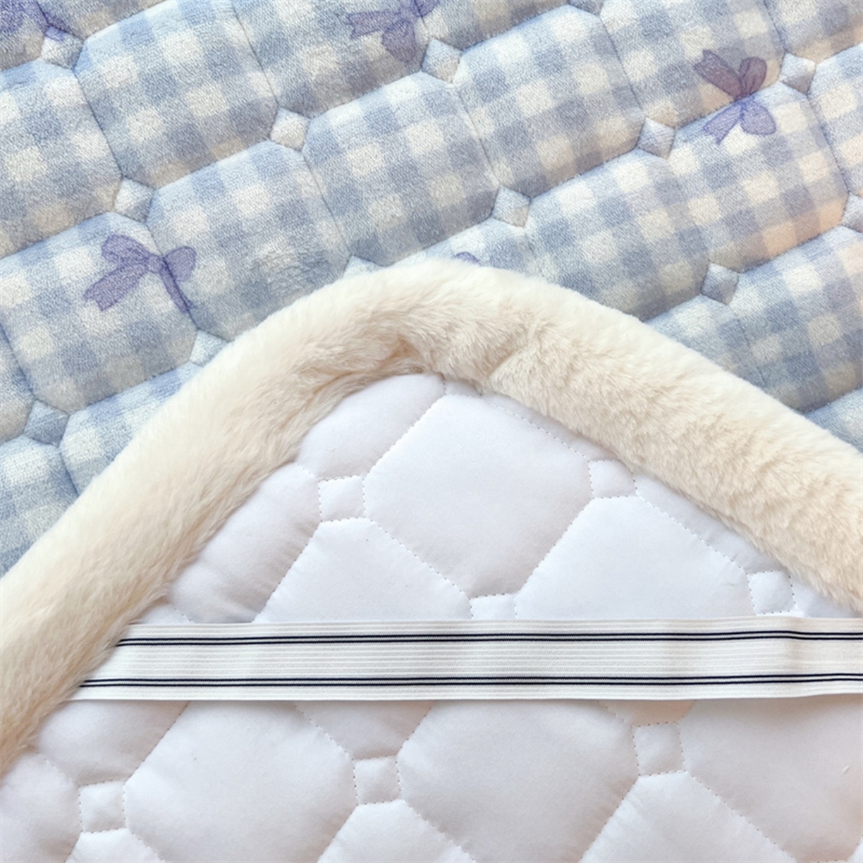 91家纺网 家纺一手货源 找家纺 喜居 2025新款印花牛奶绒夹棉床褥垫床垫子褥子 兰格浅浅