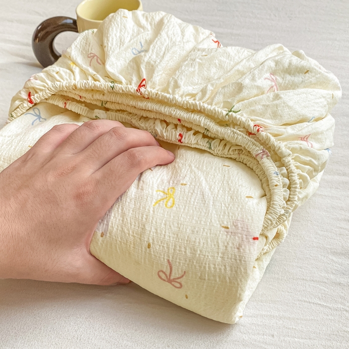 91家纺网 家纺一手货源 找家纺 朵朵家纺 2025新款超柔印花单床笠单品学生宿舍床垫保护套 床笠（床垫保护套可定制尺寸 ） 奶油蝴蝶结