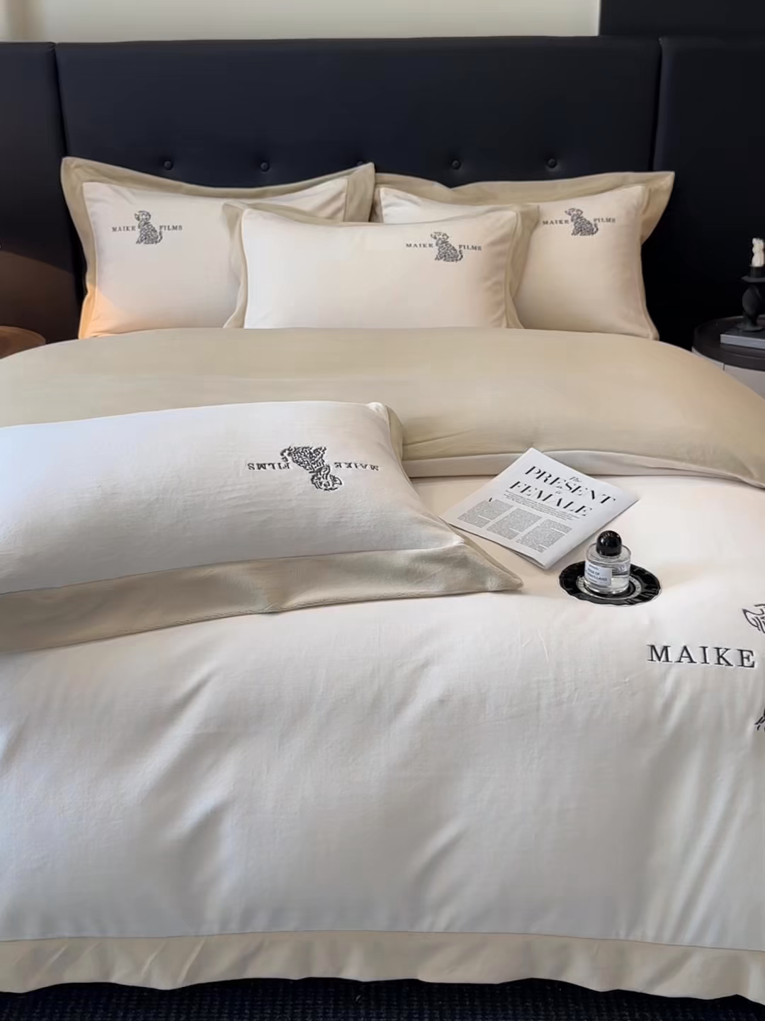 91家纺网 家纺一手货源 找家纺 笙意家纺 2025新款A类牛奶绒加厚卡通刺绣四件套-旺仔 旺仔-奶昔白+奶茶