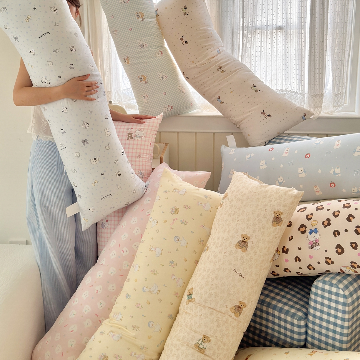 91家纺网 家纺一手货源 找家纺 乐童家纺 2025新款解压神器夹腿长条抱枕 组合图