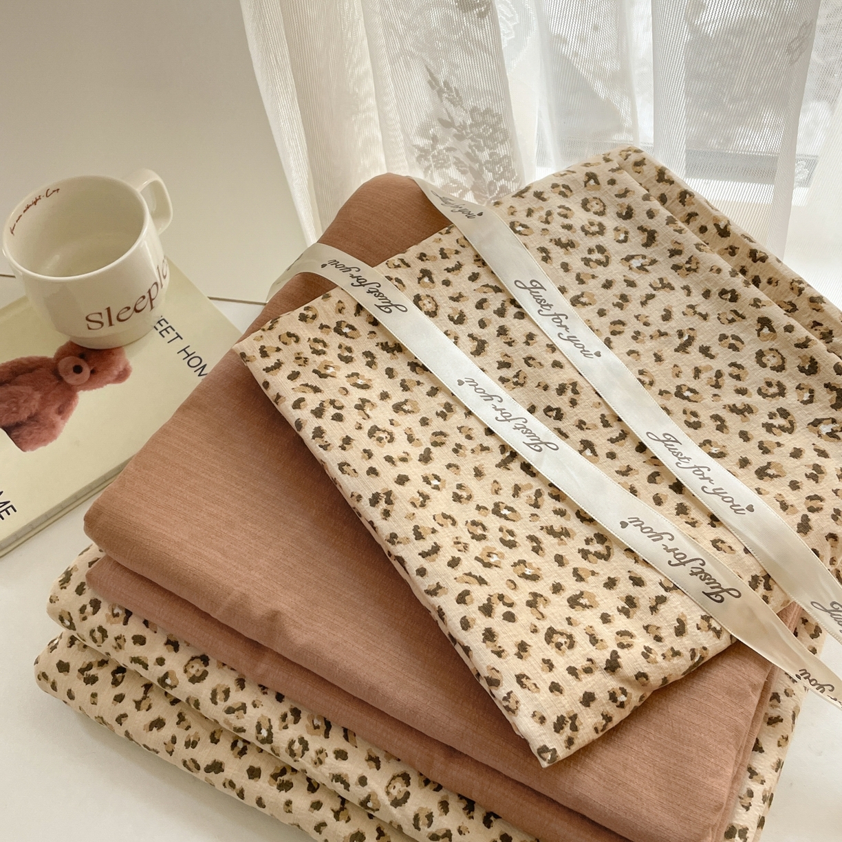 91家纺网 家纺一手货源 找家纺 铺尚美家纺 2025新款云感提花双层纱系列 小豹纹