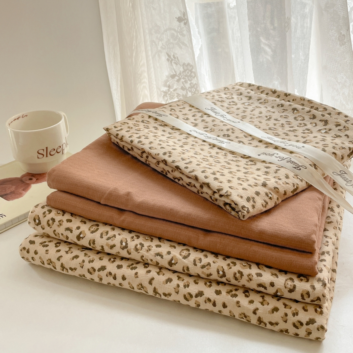 91家纺网 家纺一手货源 找家纺 铺尚美家纺 2025新款云感提花双层纱系列 小豹纹