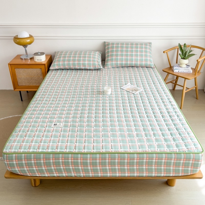 91家纺网 家纺一手货源 找家纺 蕾诺家纺 2025新款色织水洗棉棉花夹棉床笠保护套 橘绿条