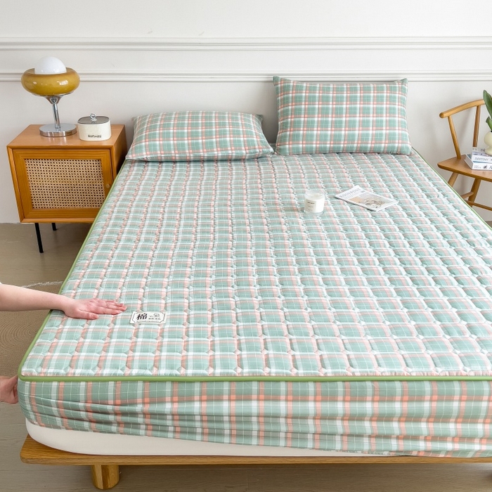 91家纺网 家纺一手货源 找家纺 蕾诺家纺 2025新款色织水洗棉棉花夹棉床笠保护套 橘绿条