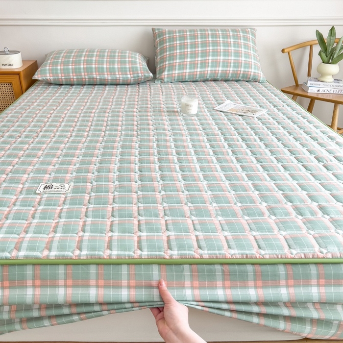 91家纺网 家纺一手货源 找家纺 蕾诺家纺 2025新款色织水洗棉棉花夹棉床笠保护套 橘绿条