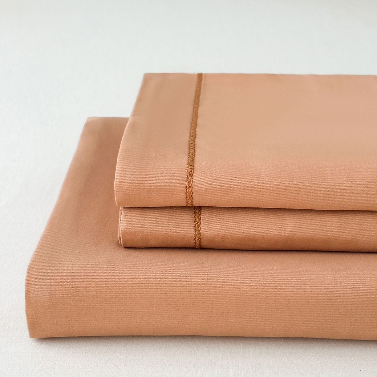 91家纺网 家纺一手货源 找家纺 宝时兰 2025新款加厚100%全棉长绒棉纯色磨毛单品床单纯棉枕套高密【提供买家秀/可定制其他尺寸】 琥珀橙